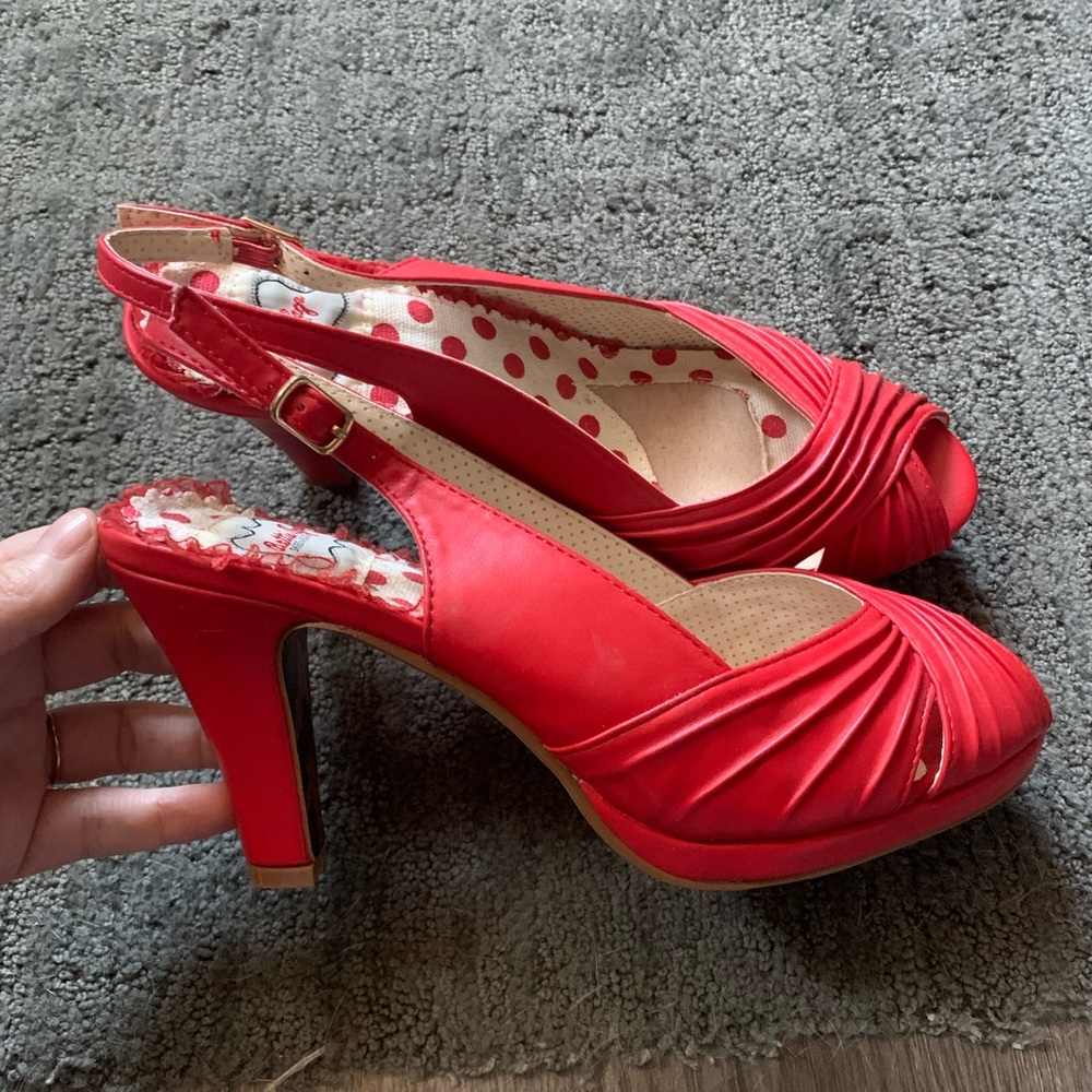Brand new, never worn, Bettie Page sling-backs.